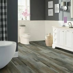 Grey Distressed Wood Multi-Width Look 6 in. x 36 in. Peel and Stick Vinyl Plank (36 sq. ft. / case) by TrafficMaster 10 Grey Distressed Wood Multi-Width Look 6 in. x 36 in. Peel and Stick Vinyl Plank (36 sq. ft. / case) by TrafficMaster -Cozy Floor Style grey distressed wood trafficmaster vinyl plank flooring wd6098 c3 1000