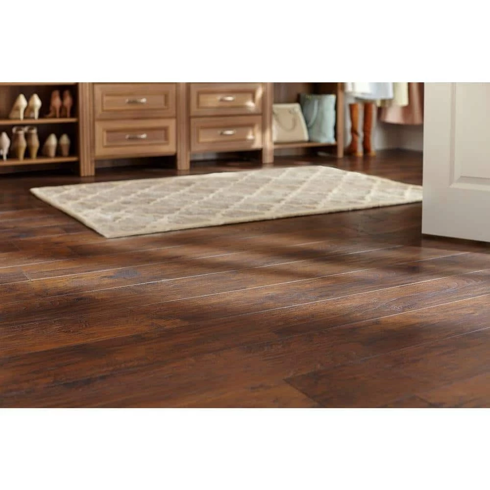 Handscraped Saratoga Hickory 7 mm Thick x 7-2/3 in. Wide x 50-5/8 in. Length Laminate Flooring (1063.5 sq. ft. / pallet) by TrafficMaster 4 Handscraped Saratoga Hickory 7 mm Thick x 7-2/3 in. Wide x 50-5/8 in. Length Laminate Flooring (1063.5 sq. ft. / pallet) by TrafficMaster - Image 2